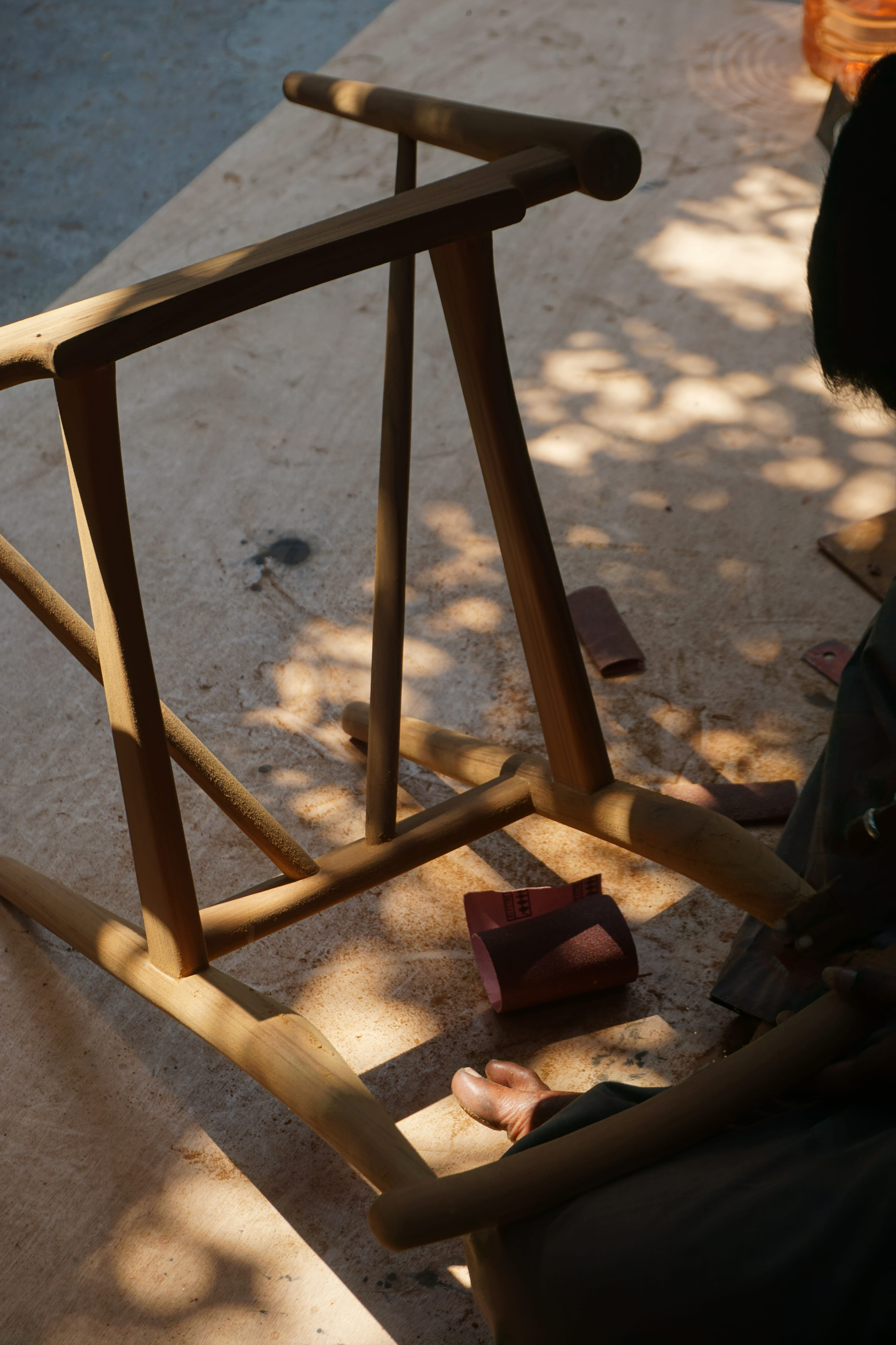 Finished wooden furniture with a smooth hand-rubbed finish