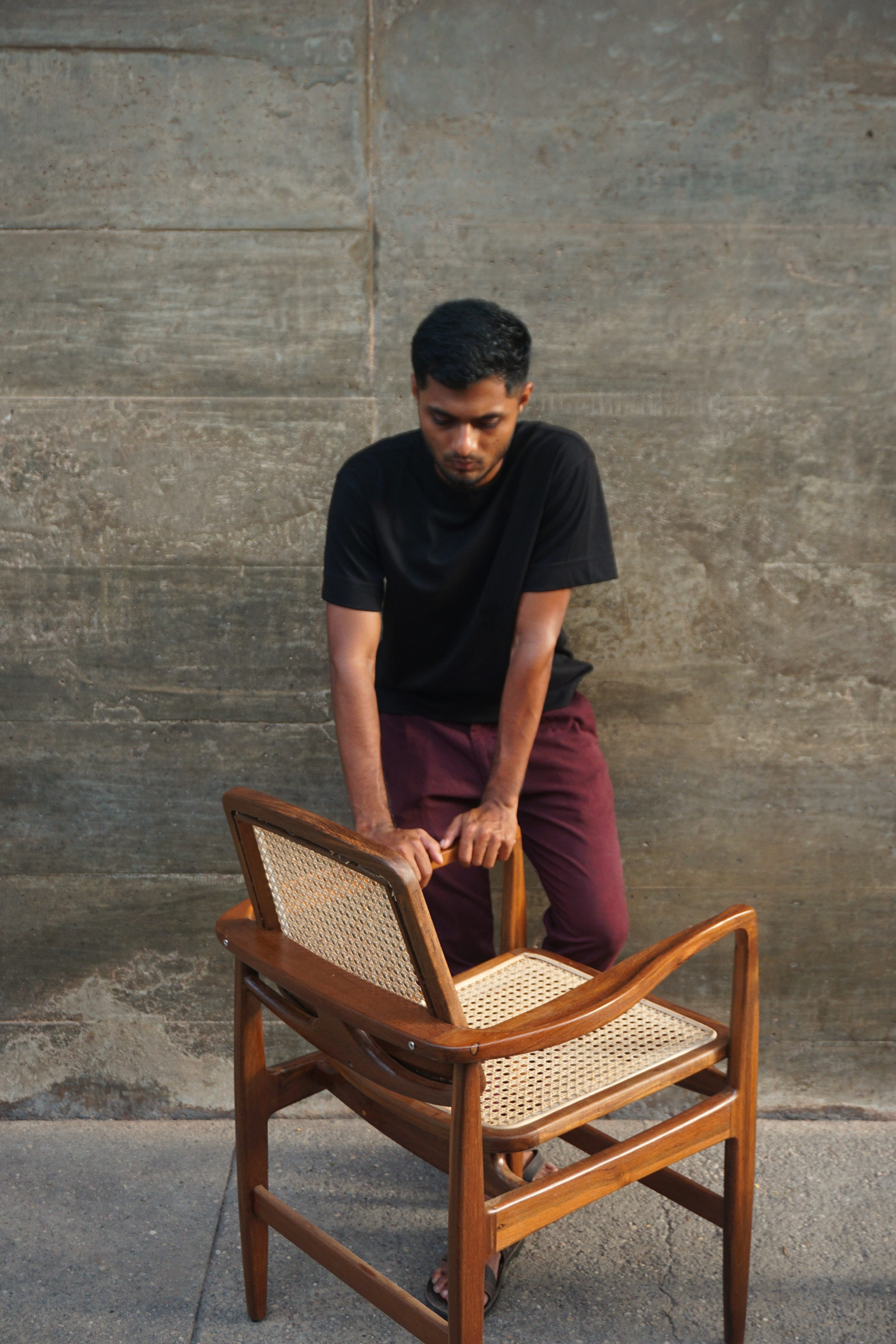 Mohammed Safvan working on furniture design at East Coast Modern workshop