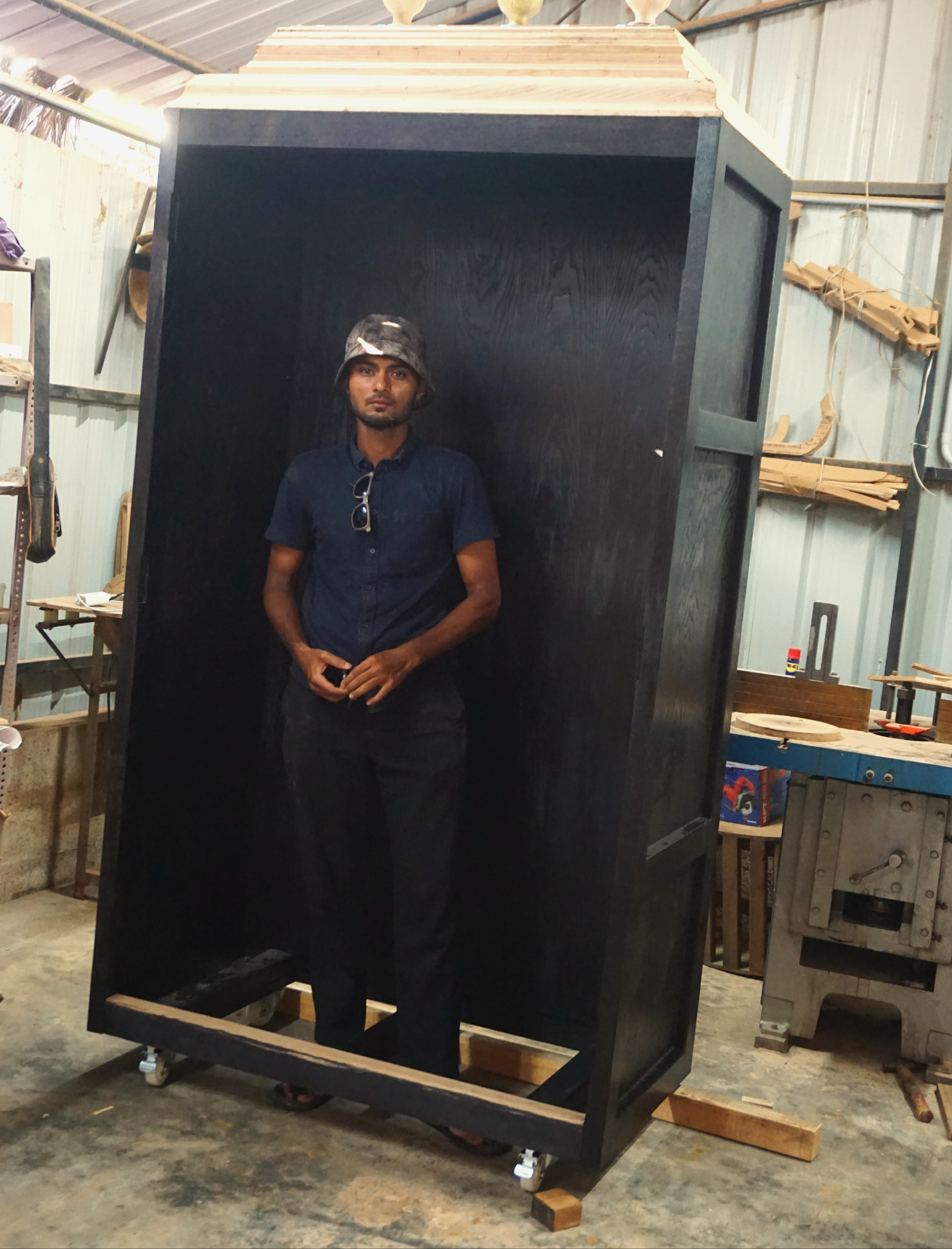 Architect Mohammed Safvan with mid-century modern furniture piece